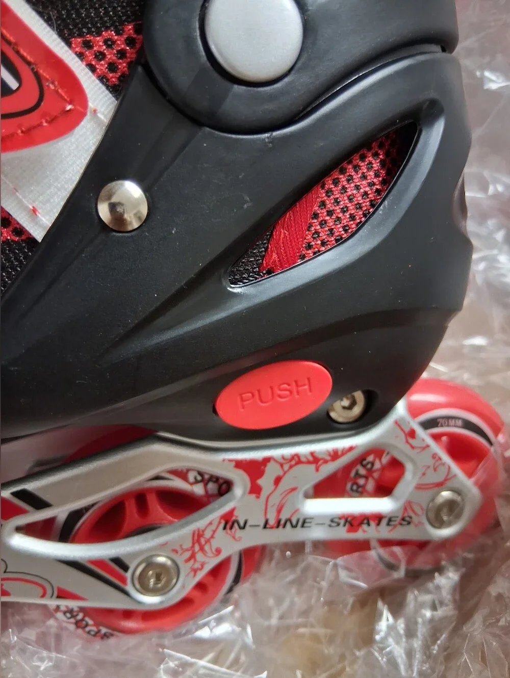 NIB-Youth Red and Black Adjustable Inline Roller Skates